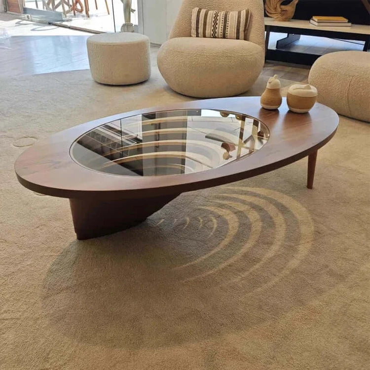 Modern coffee table with glass top in a living room setting