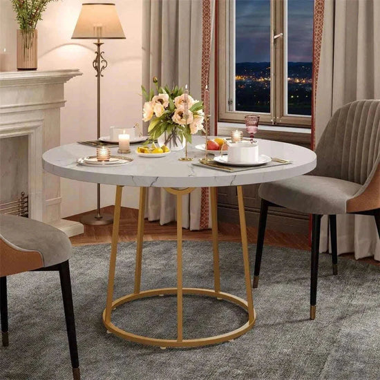Stylish round dining table for 4 with elegant decor and comfortable seating in a modern interior.