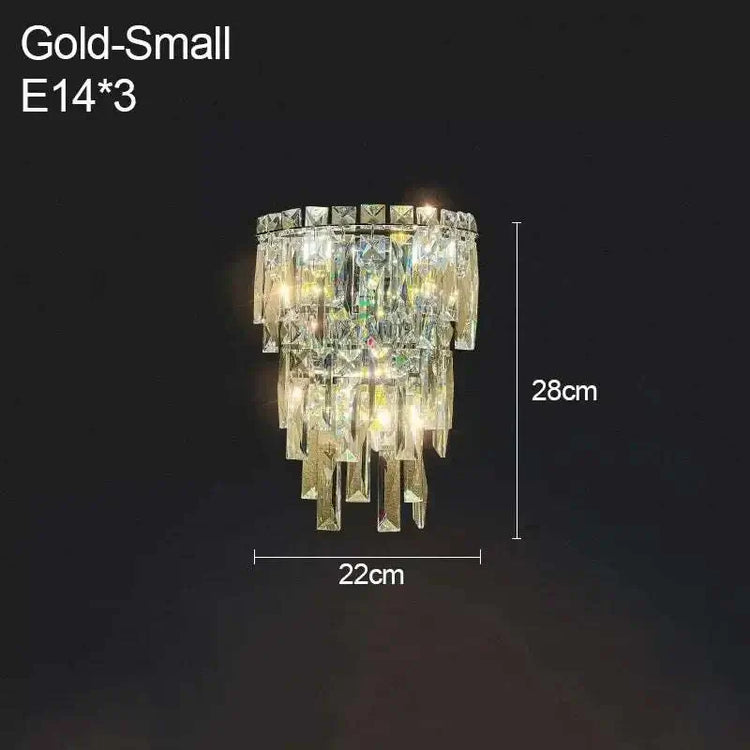 Gold small crystal wall lamp with cascading crystals and dimensions 28cm height by 22cm width