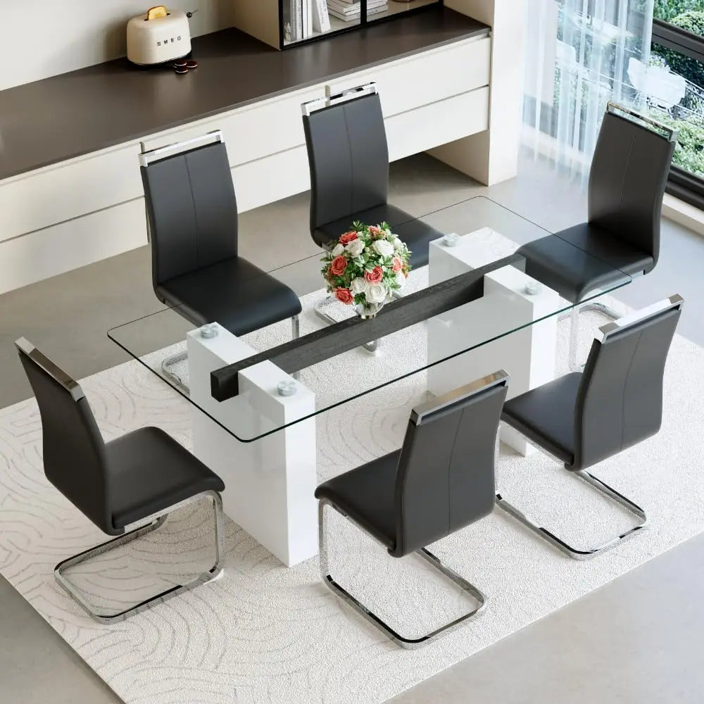 Modern dining table with black chairs in a stylish room.