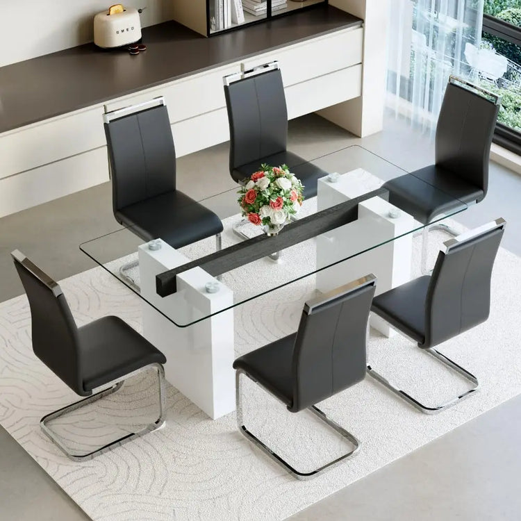 Modern dining table with black chairs in a stylish room.