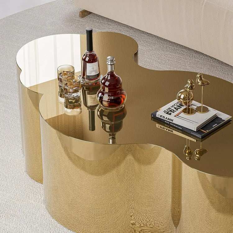 Modern Gold Stainless Coffee Table, Large Cloud Fashion Design Accent Table for Living Room Bedroom with decorative items.