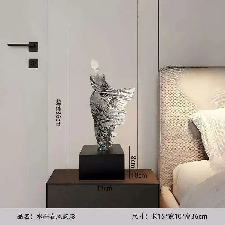 Decorative lamp on a nightstand with dimensions indicated
