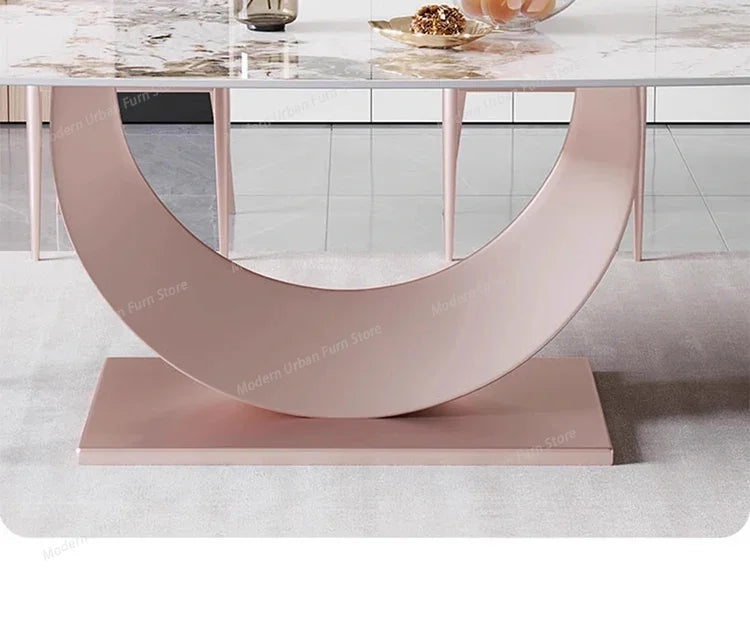 Luxury Nordic dining set featuring a stylish circular pink base and elegant marble tabletop.