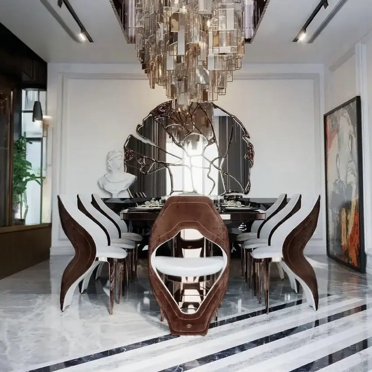 High End Modern Luxury Dining Table Marble Top Golden Stainless Steel Dinning Table Set for Kitchen Hotel Villa with stylish chairs and chandelier.
