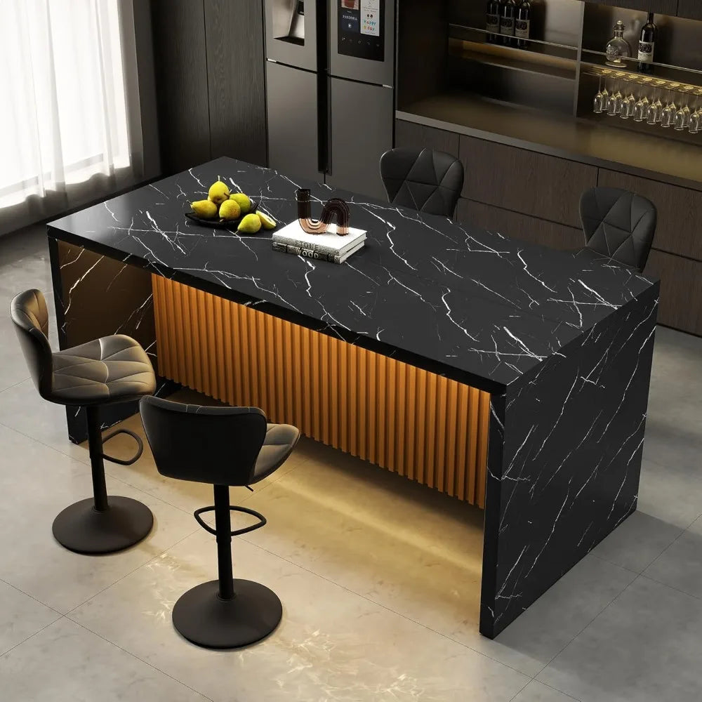 Modern kitchen island with black marble countertop and bar stools.