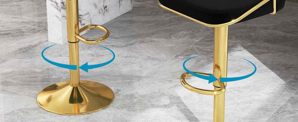 Gold bar stools with black seats on a marble floor