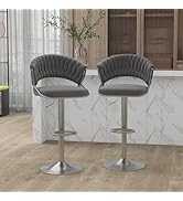 Two gray bar stools with chrome bases on a wooden floor.