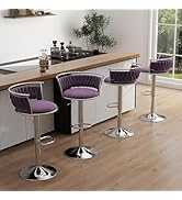 Purple bar stools with chrome bases in a modern kitchen setting