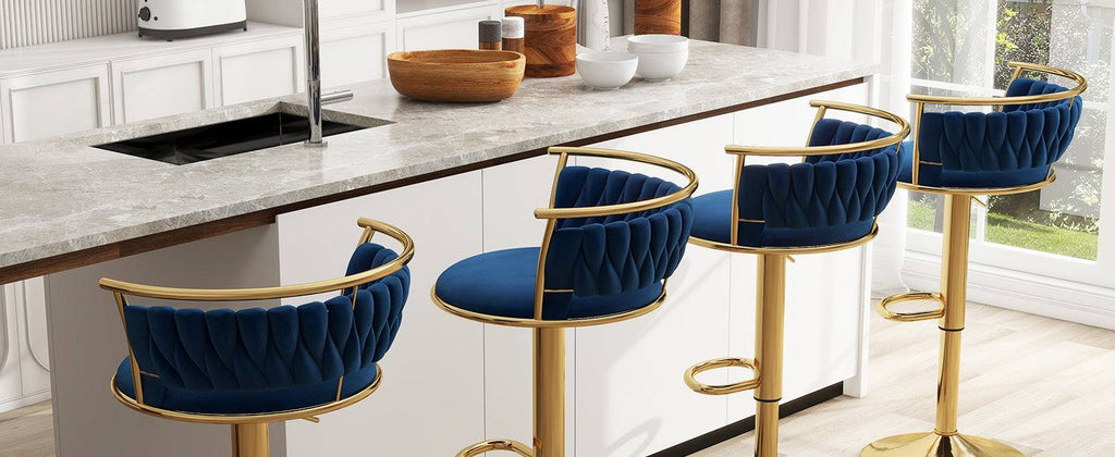 Blue bar stools with gold legs in a modern kitchen setting
