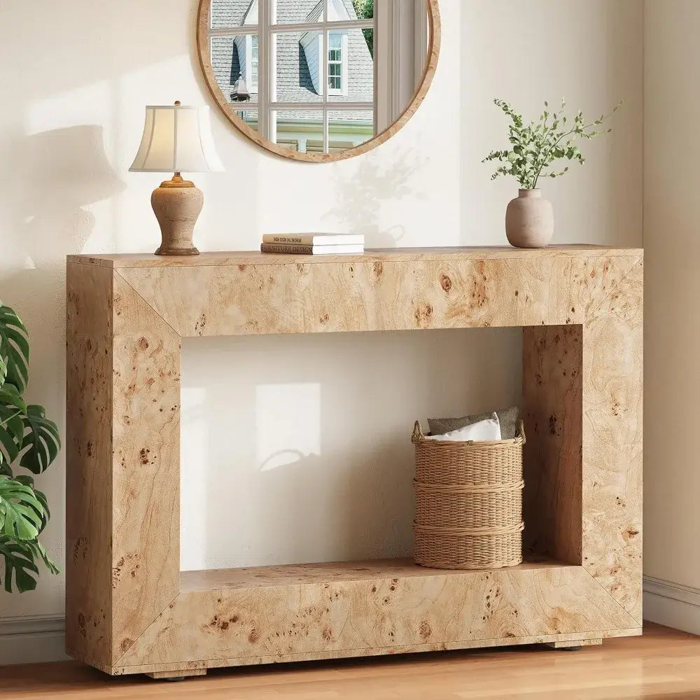 Wooden console table with decorative items in a room setting