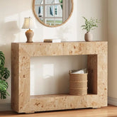 Wooden console table with decorative items in a room setting