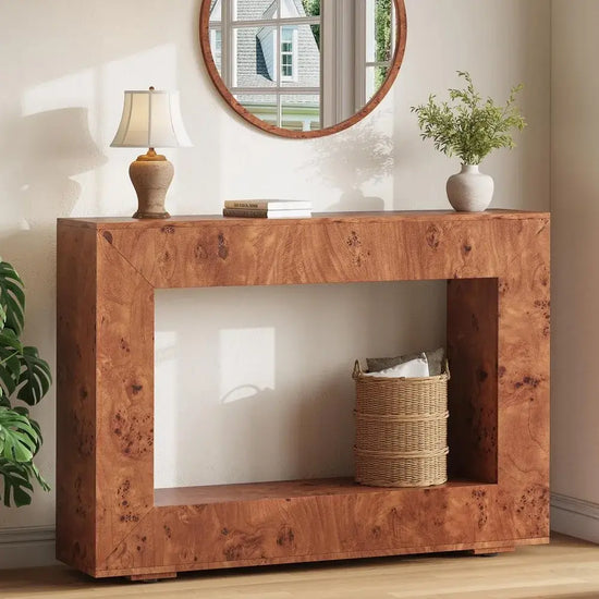 Wooden console table with decorative items in a room setting