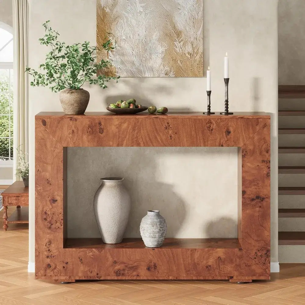 Wooden console table with decorative items in a room setting