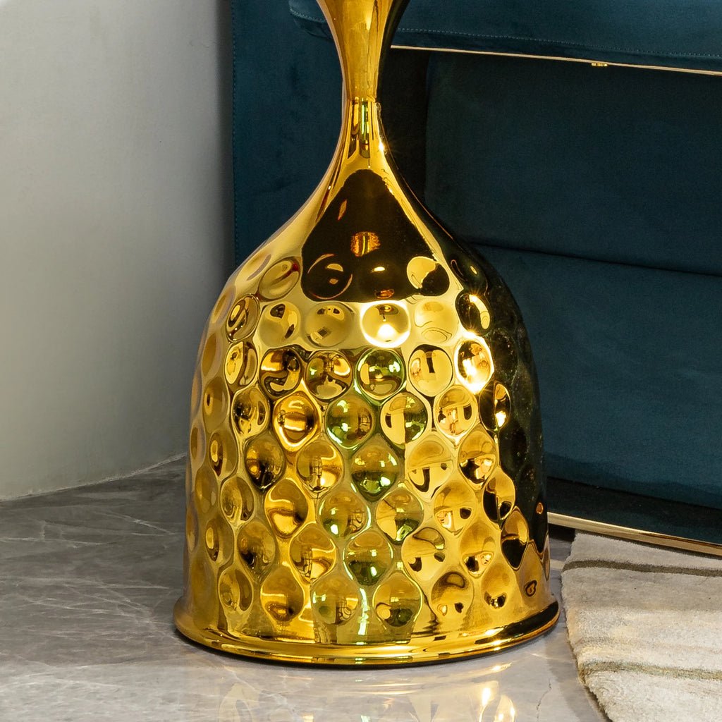 Luxury gold marble side table with a vacuum gold-plated stainless steel base, showcasing a honeycomb-inspired design.
