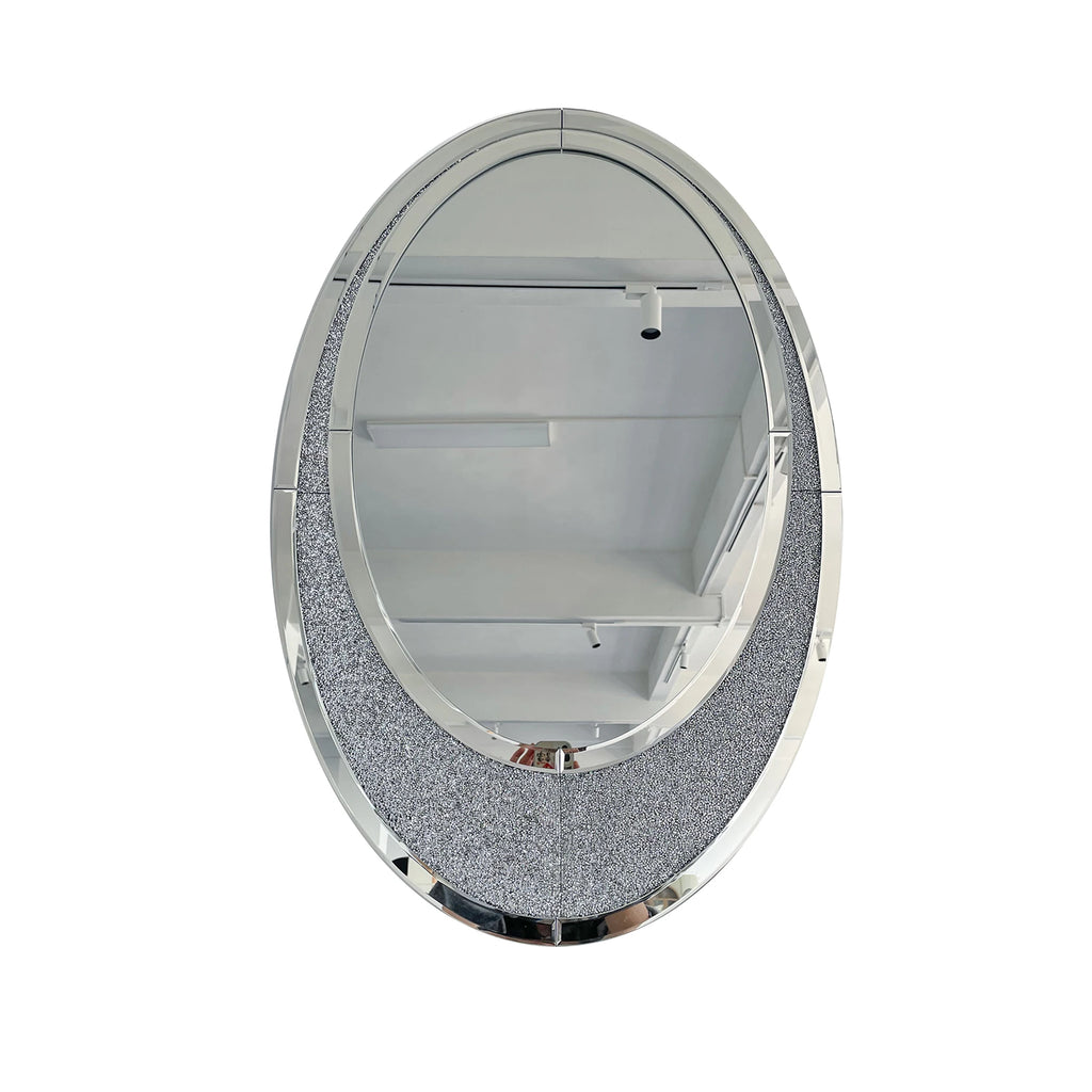 Oval mirror with decorative silver frame on a white background