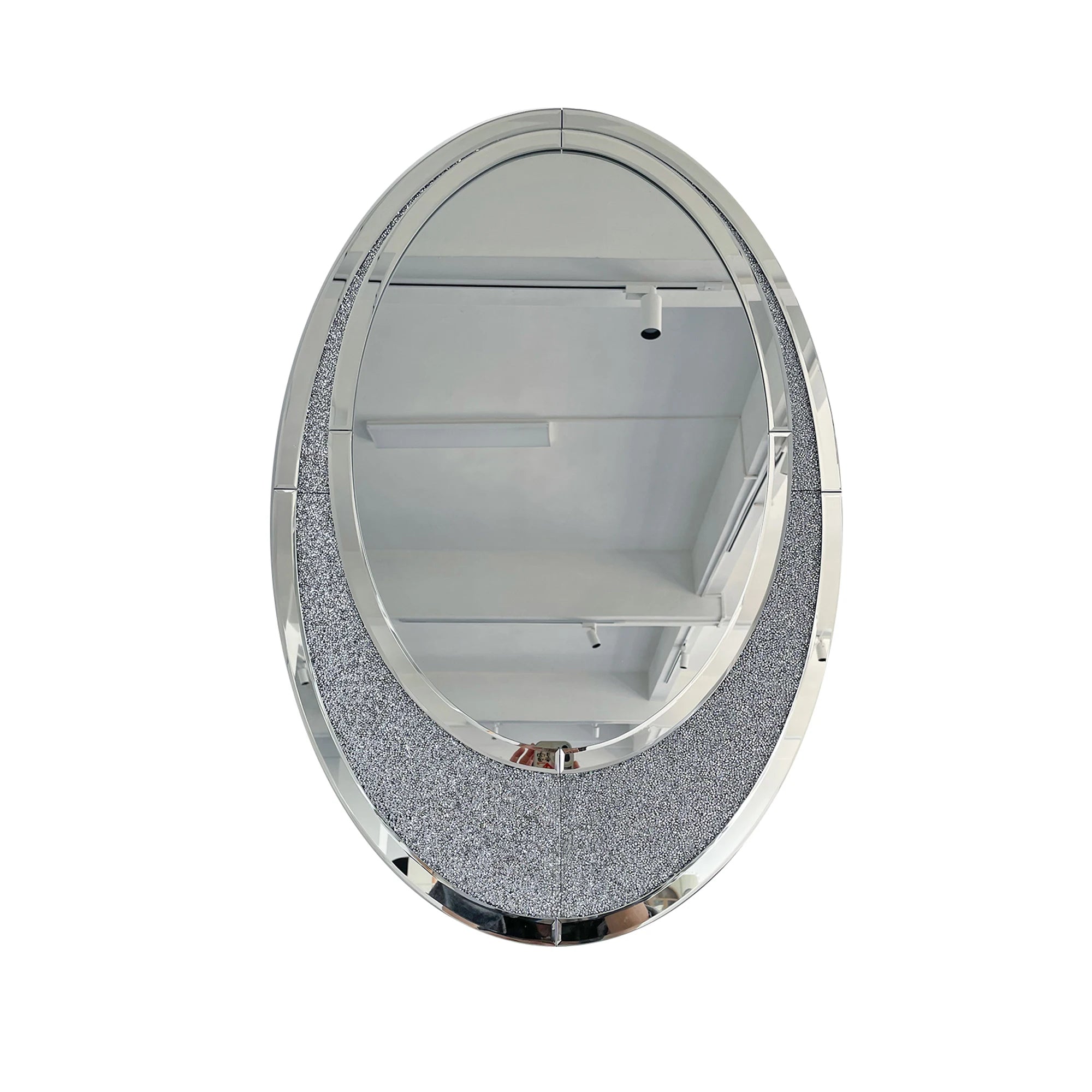 Oval mirror with decorative silver frame on a white background