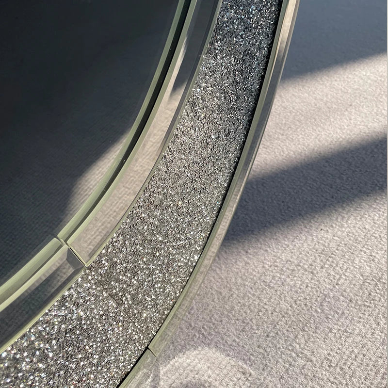 Close-up of a car tire with treads on a textured surface