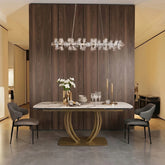 Modern dining room with a marble table, chairs, and decorative elements.