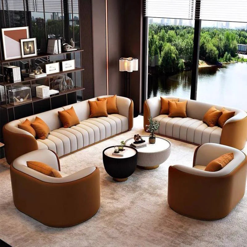 Modern luxury leather modular sofa in a stylish living room setting with large windows and elegant decor.