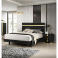 Modern king bedroom set with LED lighting featuring a black and gold color scheme and sleek nightstands.