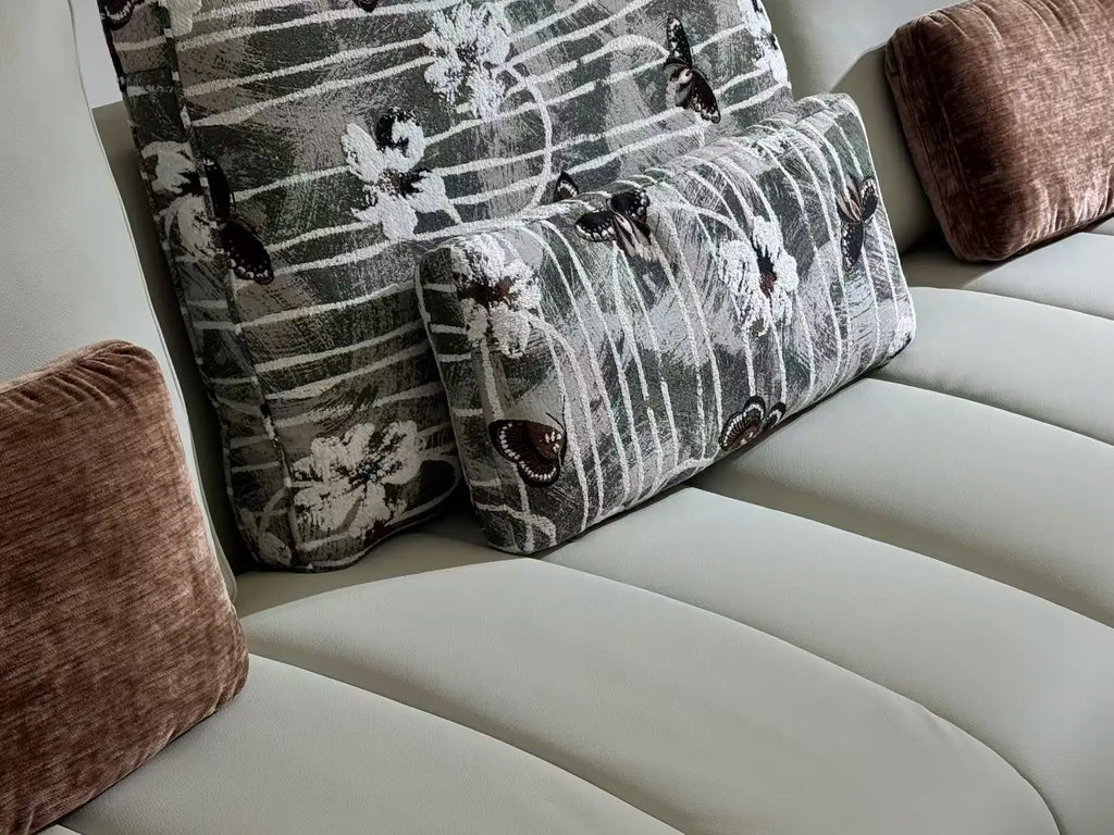 close-up of customizable luxury modular sectional sofa with patterned and textured cushions