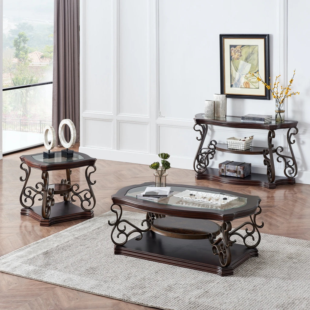 Modern metal and glass coffee table with ornate frame in a stylish living room setting.