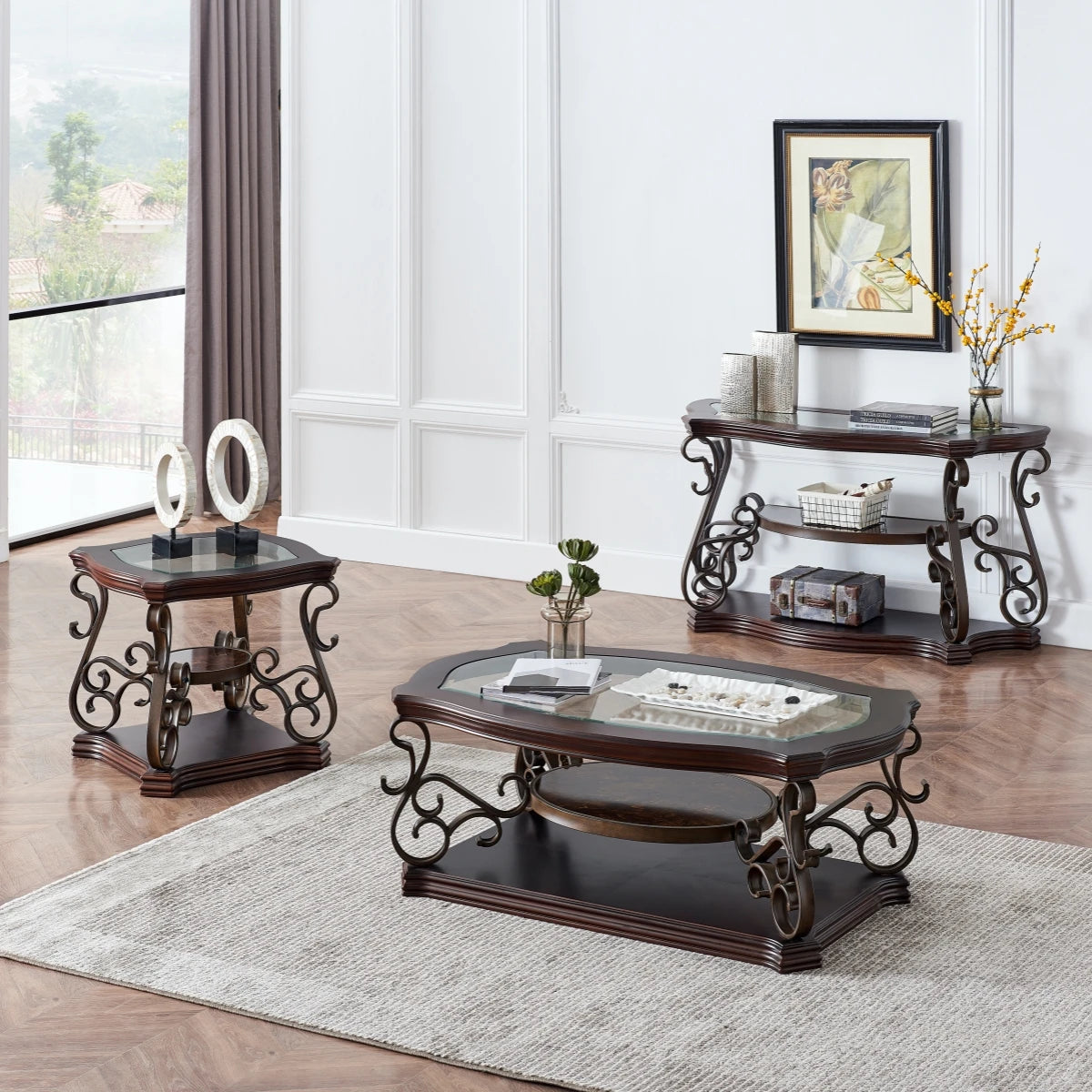Modern metal and glass coffee table with ornate frame in a stylish living room setting.