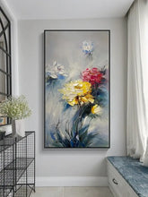Floral painting on a wall in a room with a black metal shelf and white bench.