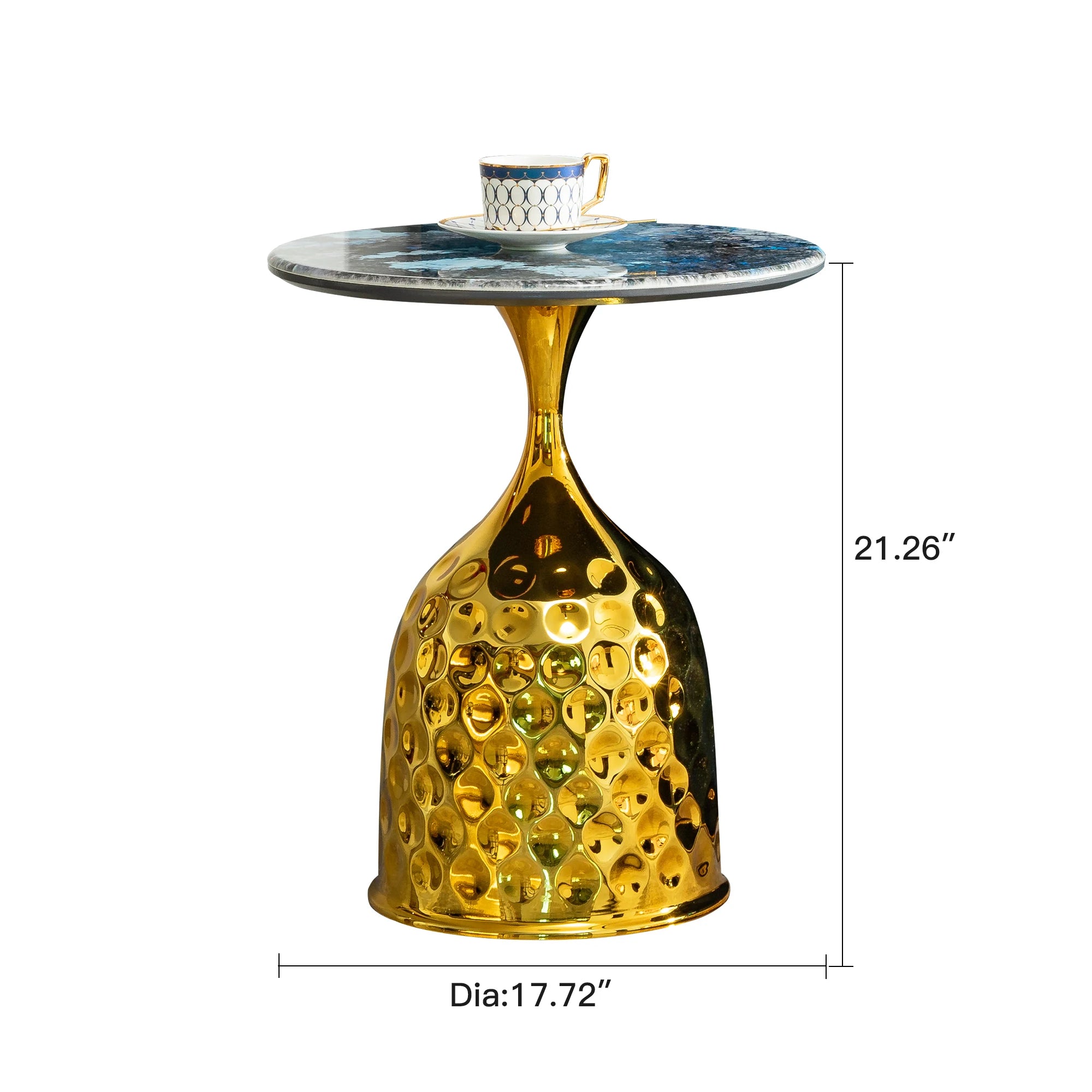 Luxury gold marble side table with honeycomb base, round top, and a coffee cup on it.