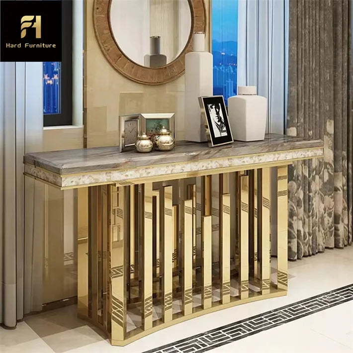 Gold stainless steel marble console table with a marble top and sleek design in a modern hallway.