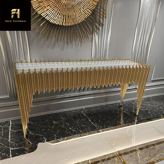 Decorative console table with gold accents in a stylish interior setting.