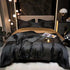 Stylish black gold yarn bedding set on a modern bed, featuring elegant design and comfortable materials.