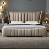 Beige upholstered bed with tufted design in a bedroom setting.