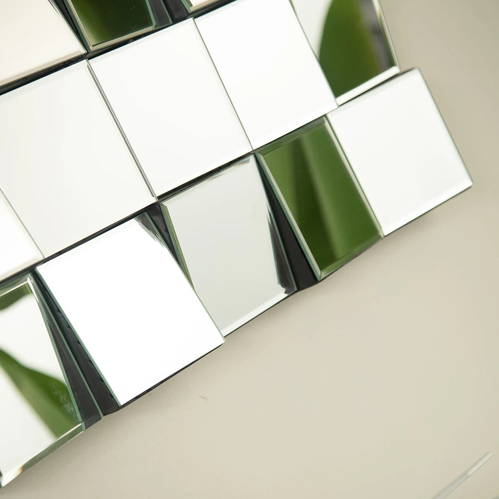 Close-up of reflective mirror tiles with a blurred background
