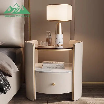 Smart nightstand with fingerprint safe featuring marble top, lamp, and 3 drawers in modern design.