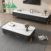 Modern living room with a black and white coffee table and TV stand.