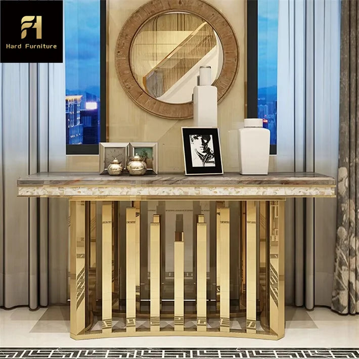 Gold stainless steel marble console table with elegant marble top and sleek gold frame in modern entryway decor.