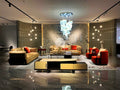 Luxury living room featuring a velvet square sofa bed set in beige and red color block, showcasing opulence and style.