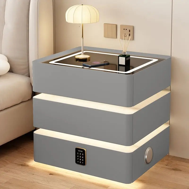 Smart nightstand with wireless charging, 3 drawers, LED lighting, sound system, and password lock in modern gray design.