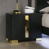 Black nightstand with gold accents in a bedroom setting