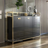 Modern black cabinet with gold accents in a room setting