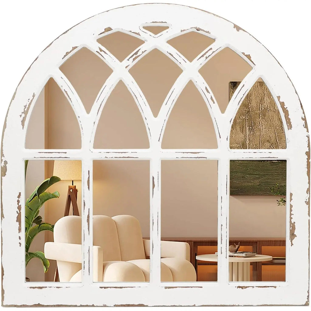 Decorative white window frame mirror showing a living room interior.