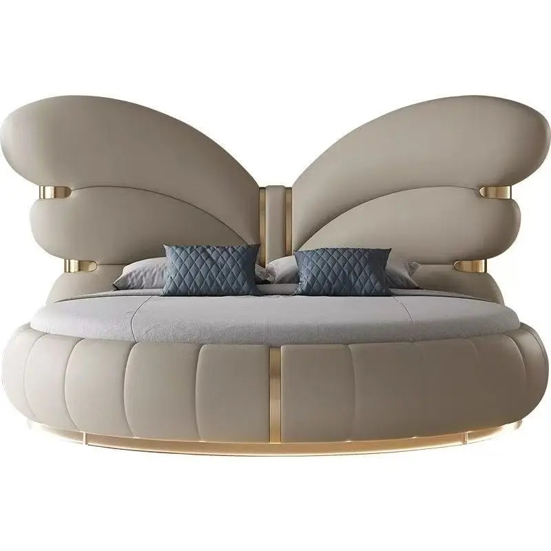 Genuine leather butterfly round bed with soft butterfly silhouette and supportive design, ideal for luxury interiors.