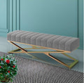 Modern tufted velvet bench with a stainless steel base, perfect for living room and bedroom decor.
