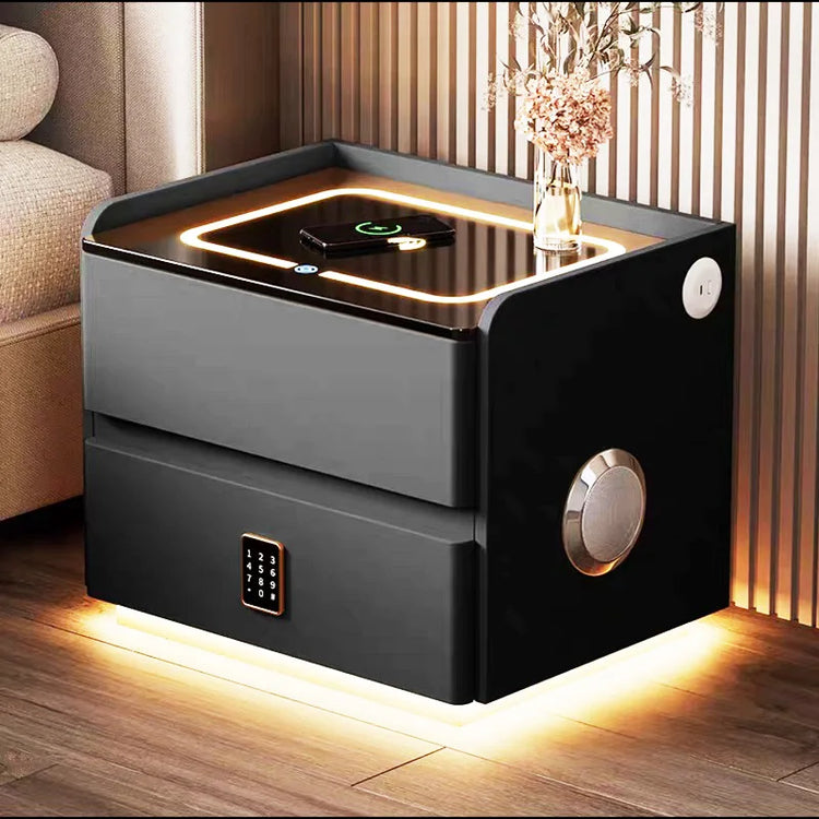 Modern black and gray side table with digital display in a living room setting.