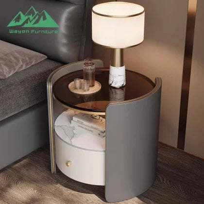 Smart nightstand with fingerprint safe featuring a marble top, modern design, and a stylish lamp.