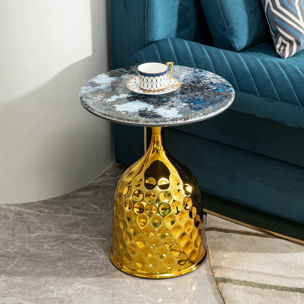 Luxury gold marble side table with honeycomb base and marble top, perfect accent for modern living rooms.