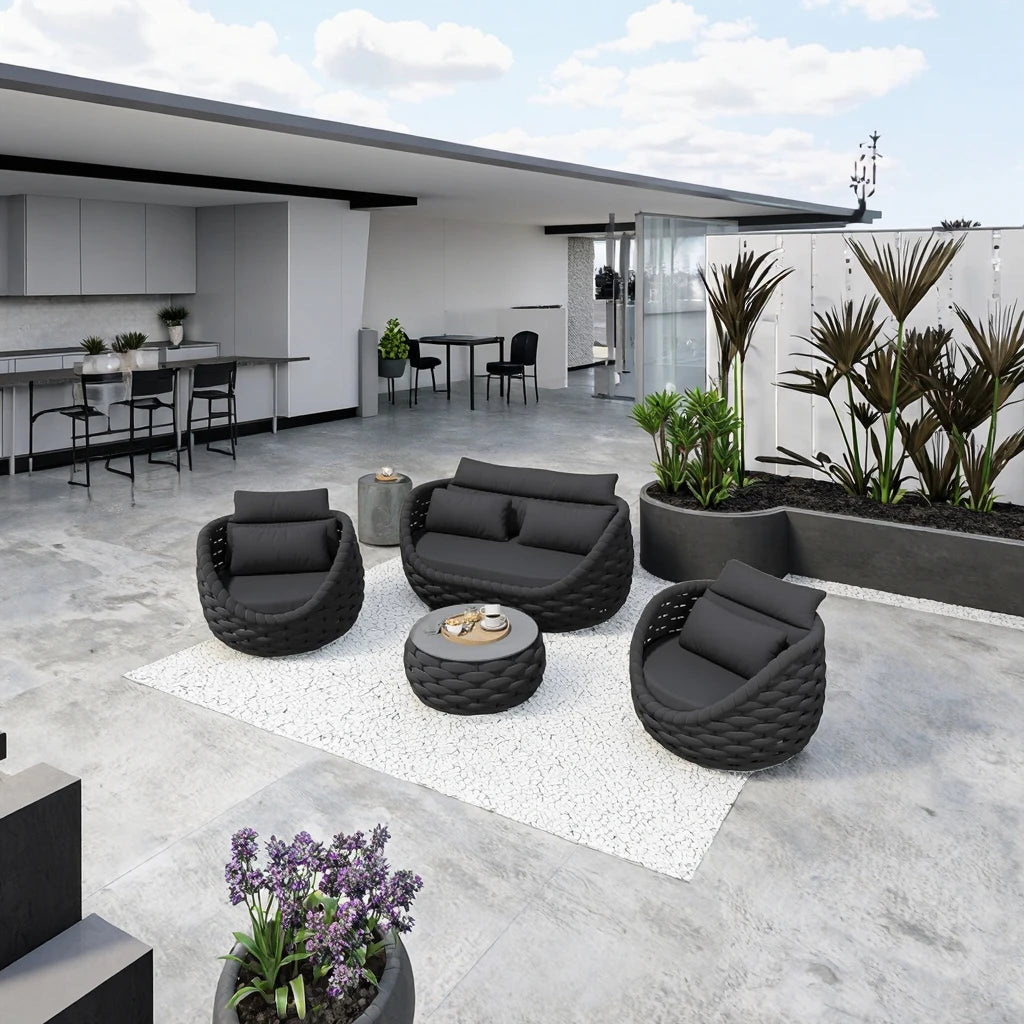 4-Piece outdoor aluminum sofa set dark gray featuring loveseat, 2 chairs, and tea table in a modern outdoor space.