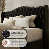 Bed with black tufted headboard and decorative pillows, featuring soft velvet fabric and high-density foam text.